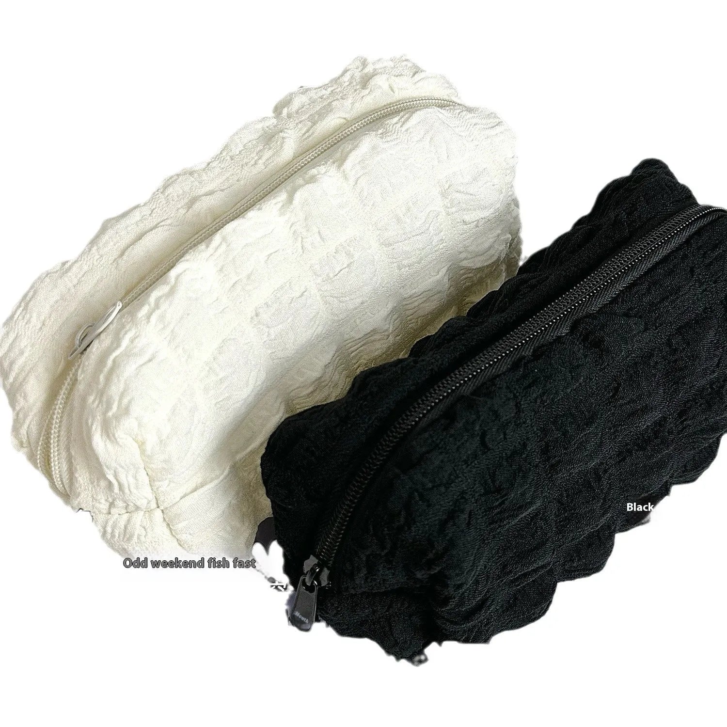 Cream puff style polyester fabric pencil case for pens, shown in beige and black colour options.