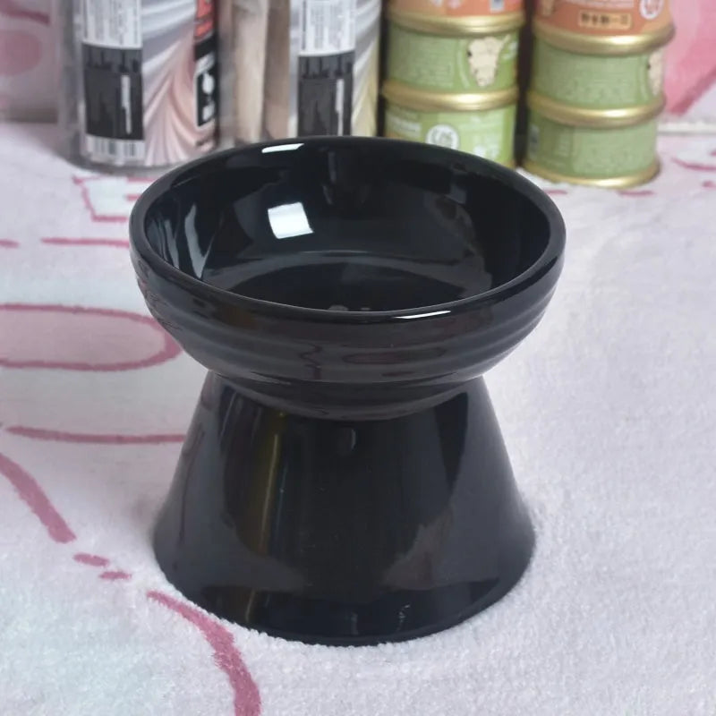 Black ceramic pet bowl with a high foot and neck protector to prevent tipping, shown with flat and slanted rim options.