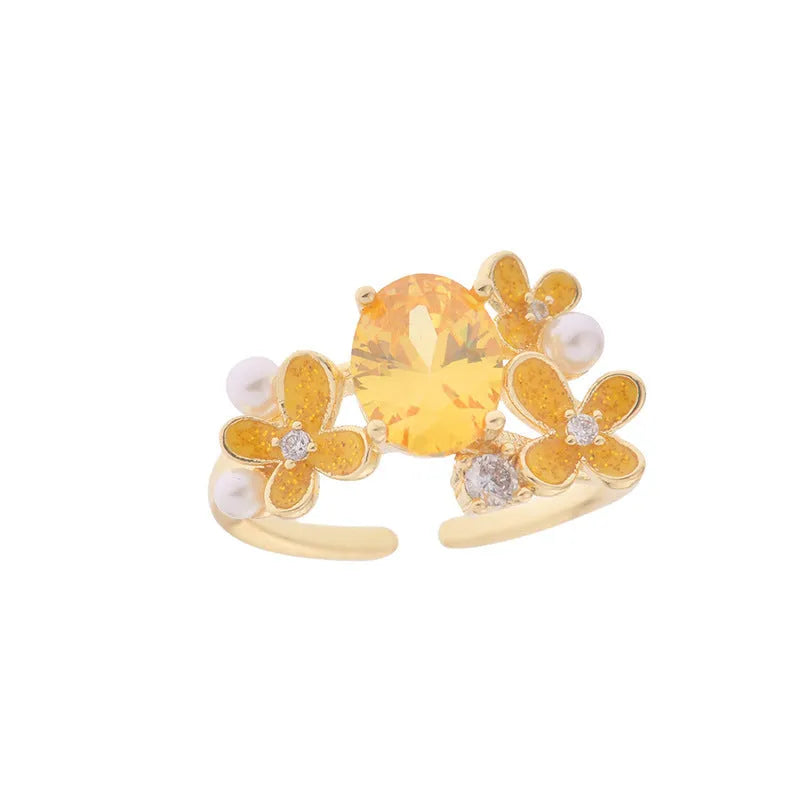 Women's floral open ring with zirconia stones in yellow or light purple electroplated metal