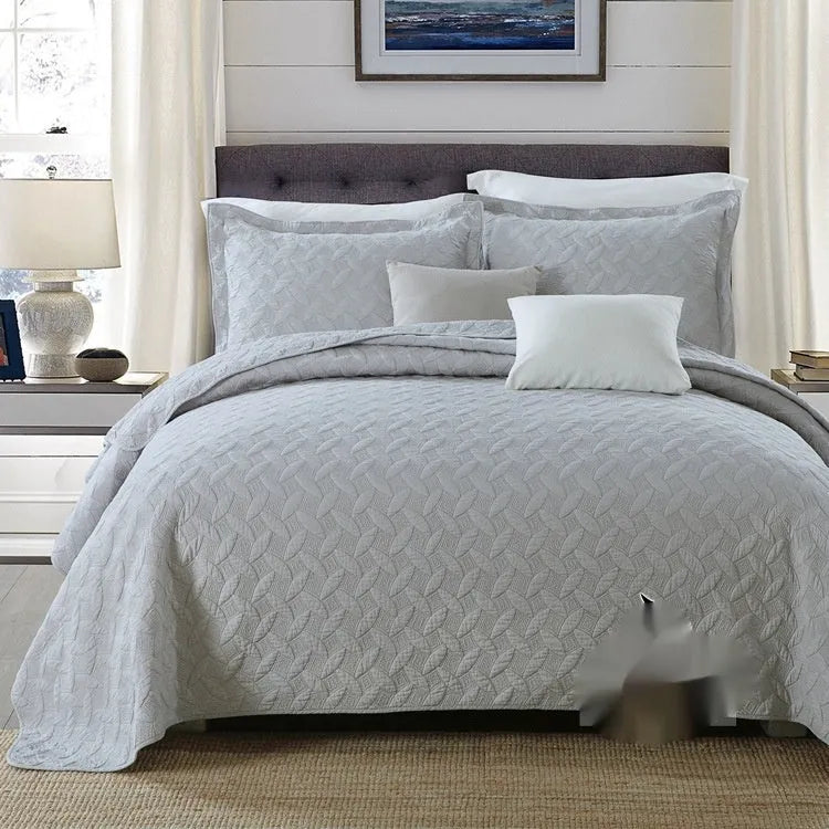 Pure cotton bed cover three-piece set shown in a light colour on a bed, featuring a quilt cover and sheet.