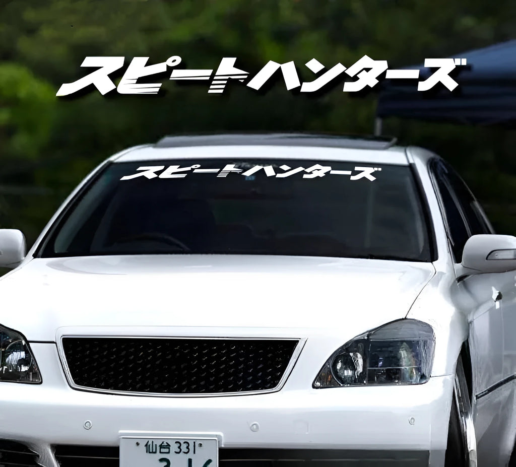 Japanese pattern car windscreen sticker garland on white background, showing its 100cm length.