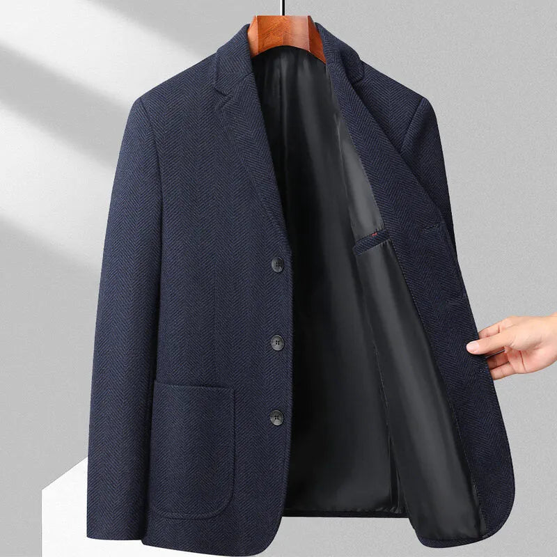 Man wearing a loose-fit solid colour wool-blend coat suitable for spring or autumn casual wear.