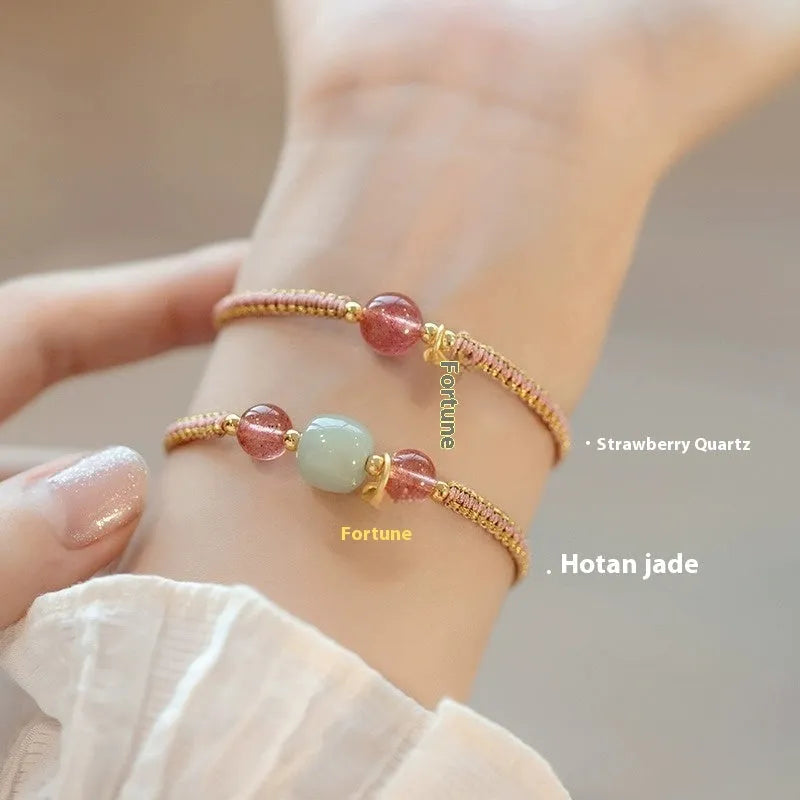 Adjustable red rope bracelet with strawberry quartz gemstones in traditional Chinese style
