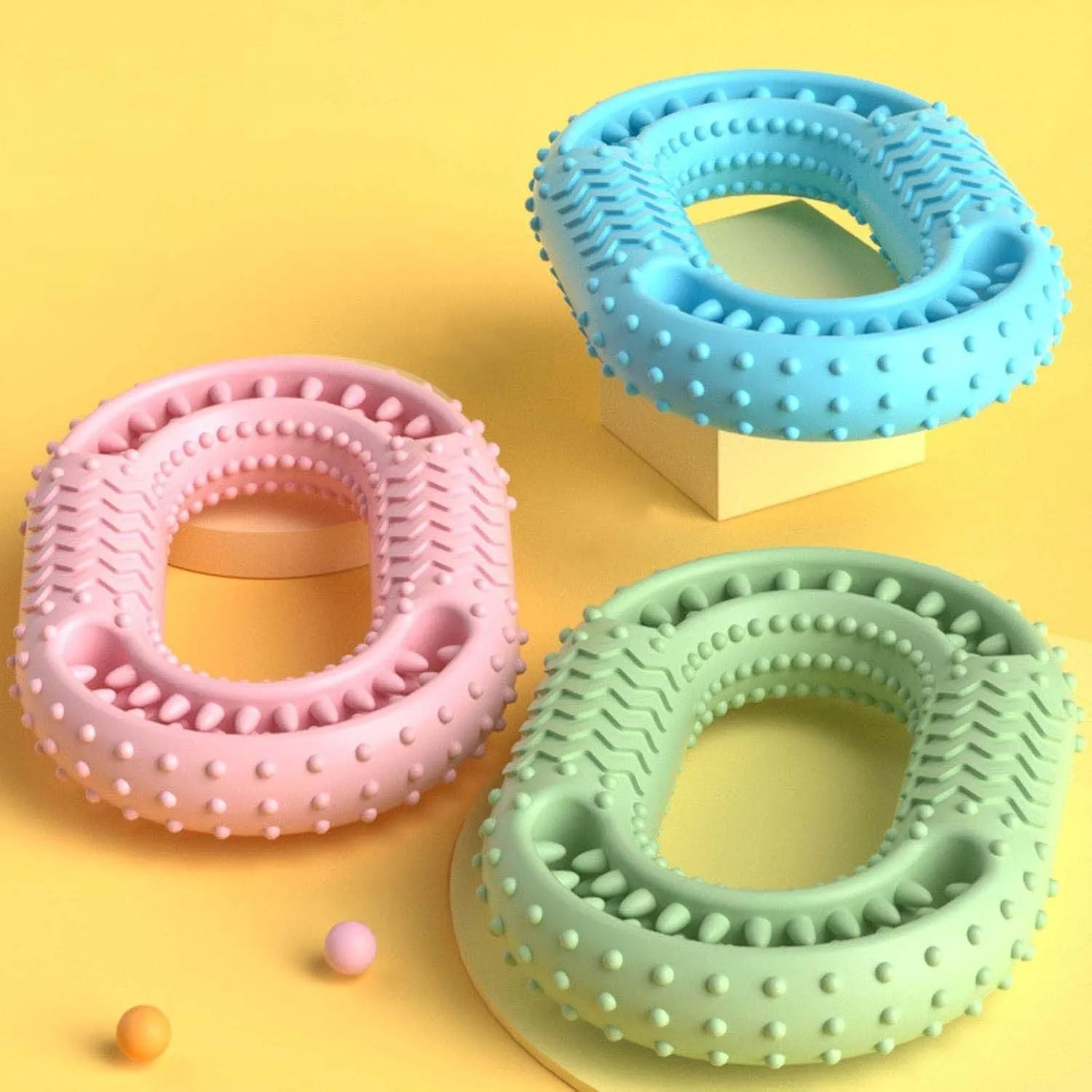 Blue green pink O-ring dog chewing toy for aggressive chewers measuring 12.5cm