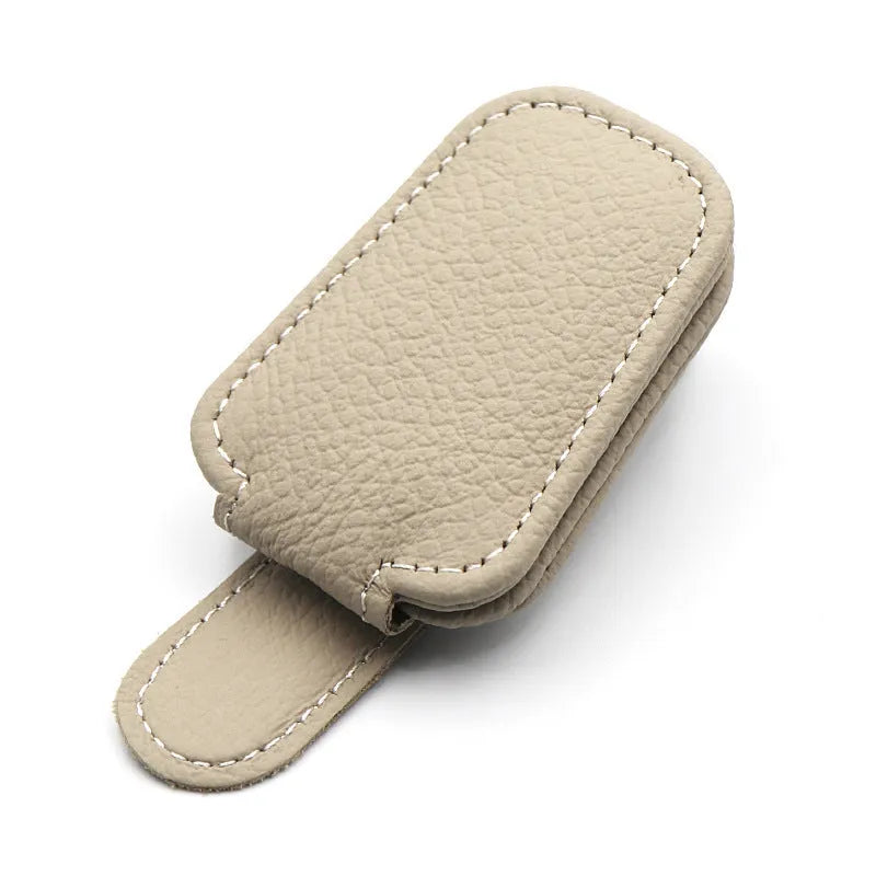 PU leather car sunglasses holder clip attached to vehicle sun visor in beige colour