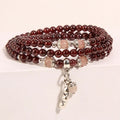 Women's wine red garnet crystal bracelet with floral Bohemian ethnic design
