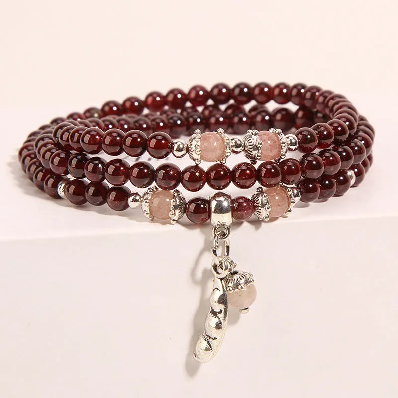 Women's wine red garnet crystal bracelet with floral Bohemian ethnic design