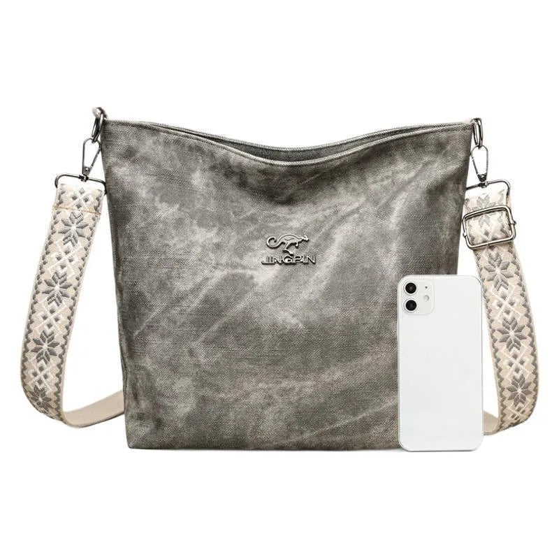 Soft PU shoulder bag in grey, pink, or yellow with adjustable strap and polyester lining