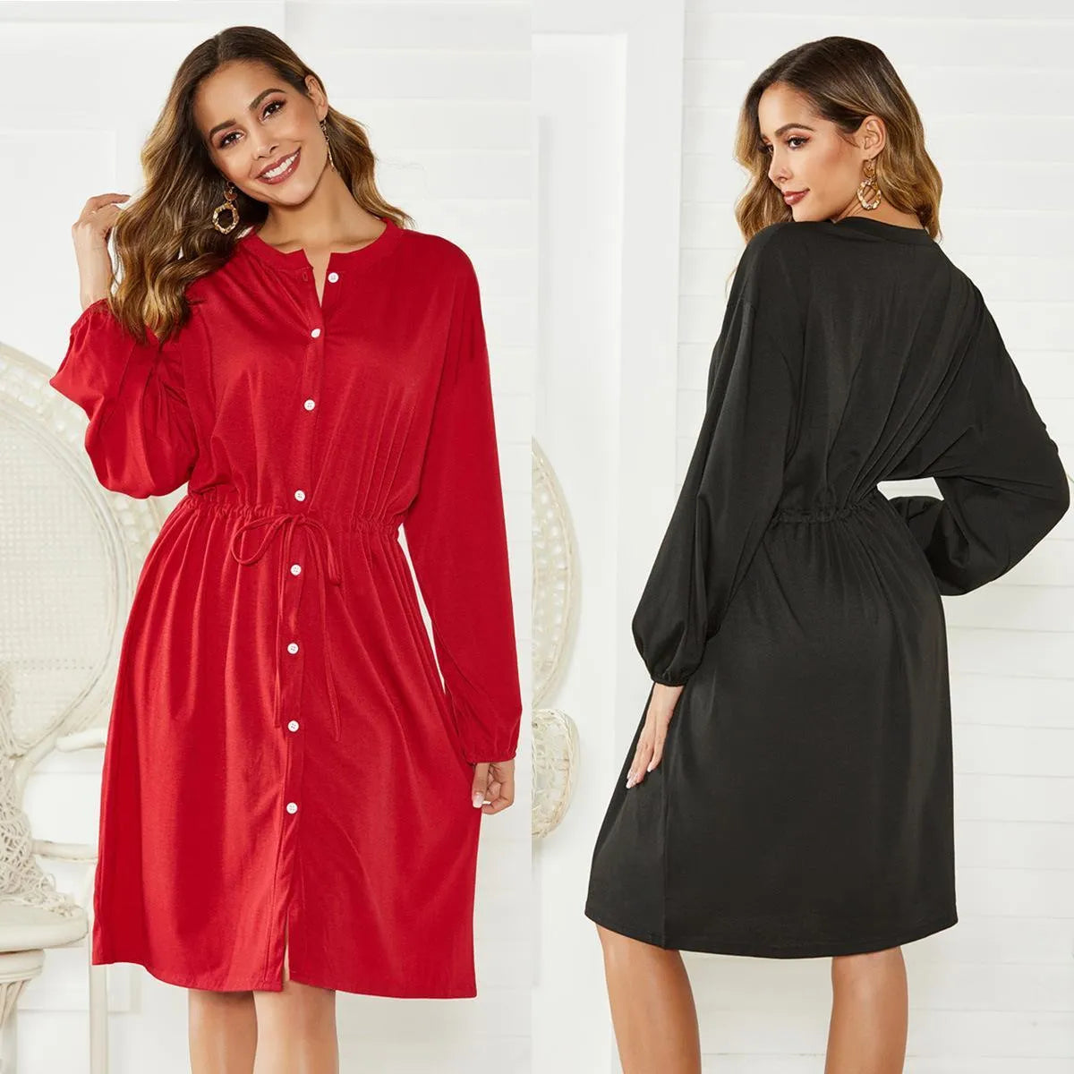 Women's black A-line mid-length dress with long sleeves, elastic cuffs, and an elastic waist belt.