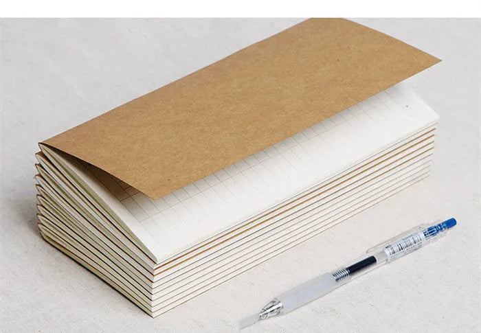 Cowhide diary refill inner core showing saddle stitch binding and 100g ivory white paper