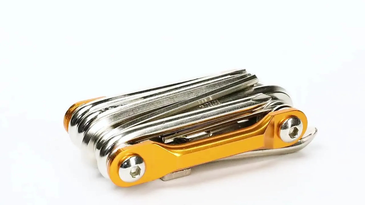 Black aluminium alloy combination tool set with chain breaker in compact storage bag for bicycle maintenance