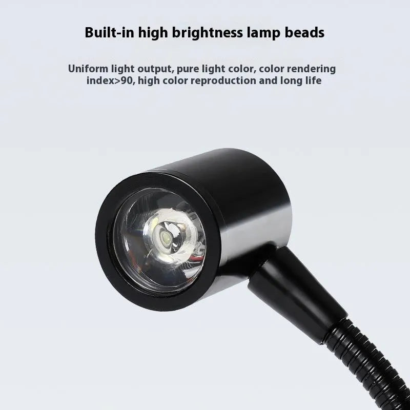 LED micro landscape lamp with copper base illuminating a small acrylic fish tank with moss plants