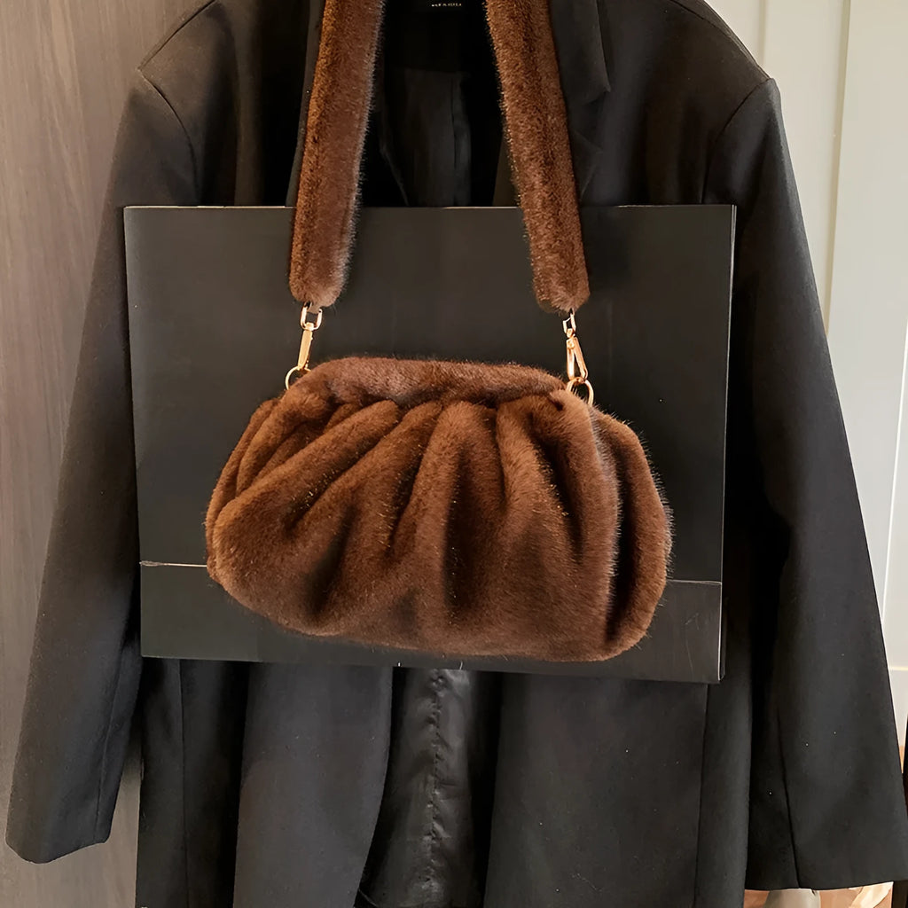 Pleated Cloud women's furry plush bucket handbag in white with stitching detail and shoulder strap