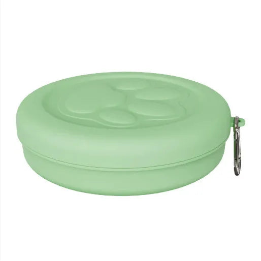 Portable outdoor dog food and water bowl in pink and green colour options.