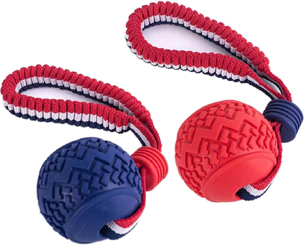 Blue dog ball with rope toy showing textured surface and cotton rope attachment