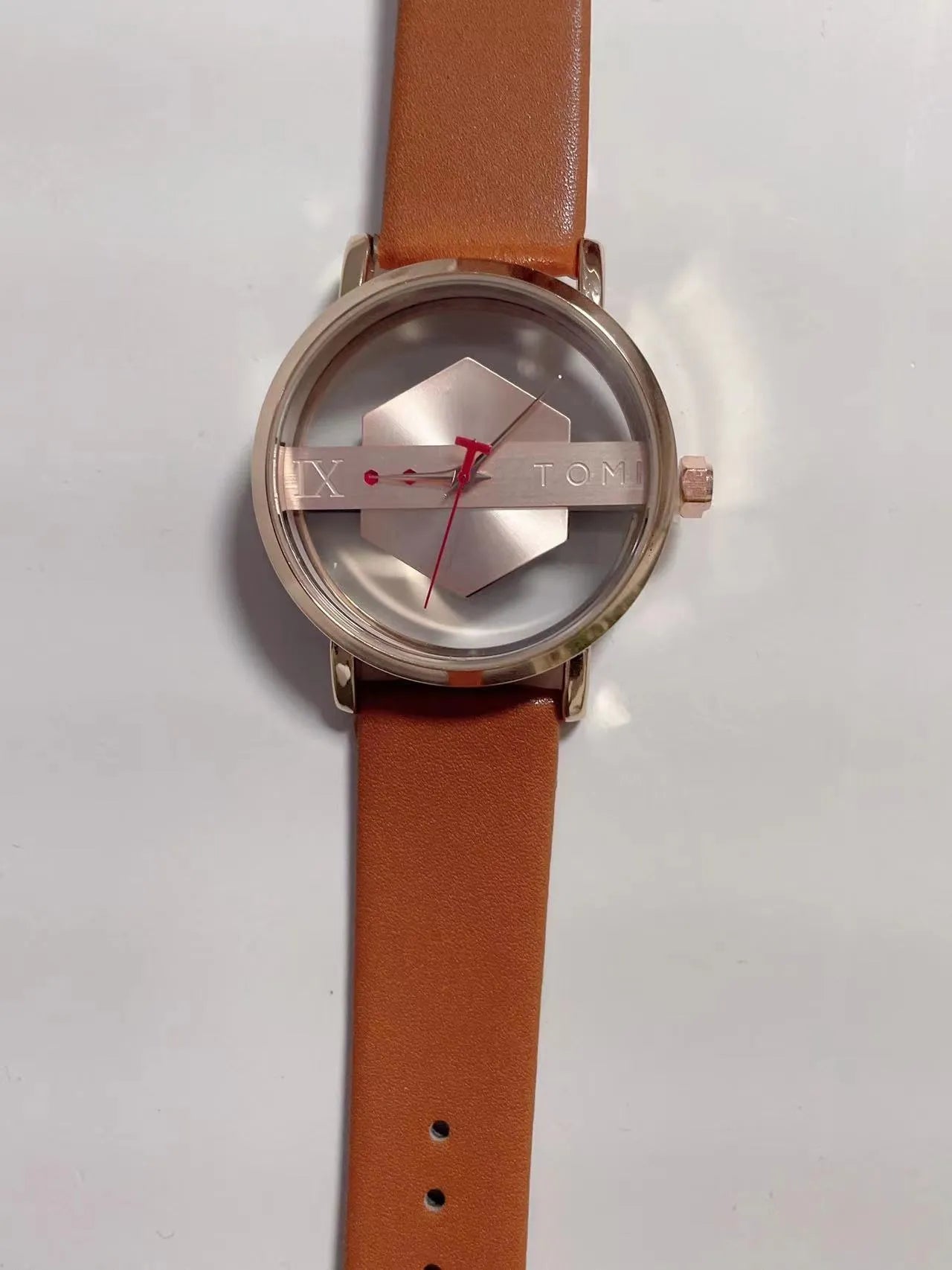Hollow out see-through unisex leather casual quartz watch with brown gold surface and slim 10mm case