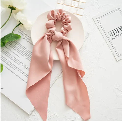 Long cloth ribbon hair tie in spring dark green colour with large intestine ring shape for ponytail or bandeau styling