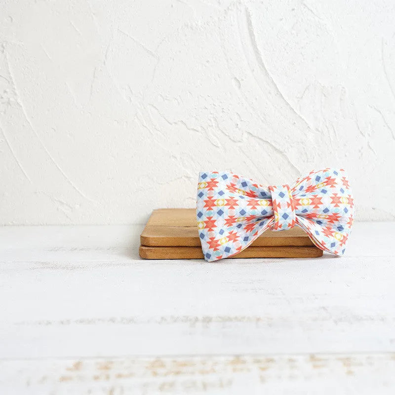 Dog bow collar in Lantern colour with attached bow and traction rope, polyester construction, size options XS to XL
