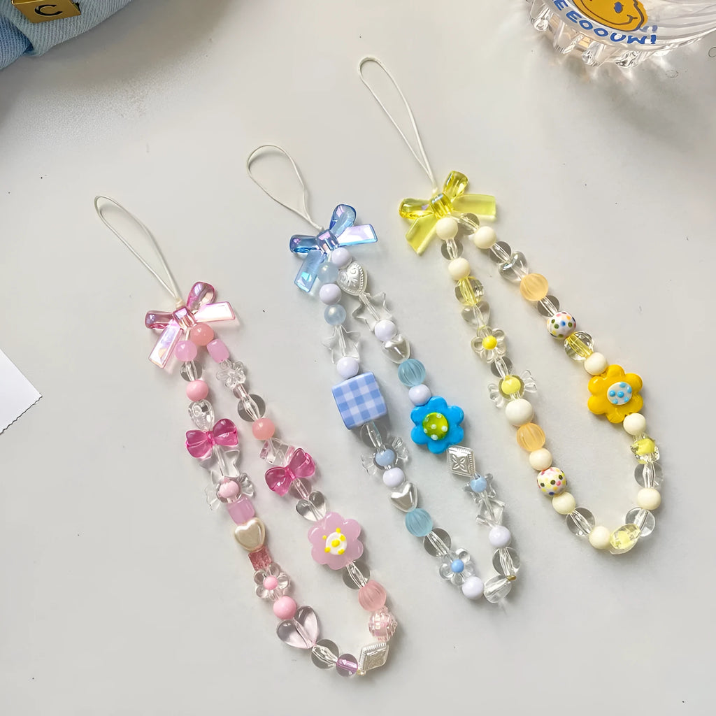 Colourful beaded flower mobile phone lanyard on rope with blue, pink, and yellow options