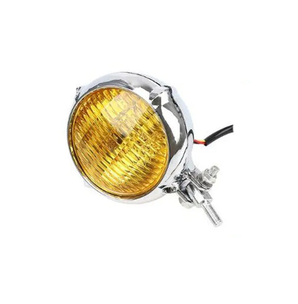 Black electroplated aluminium Harley halogen headlamp with 8cm diameter and yellow glass.