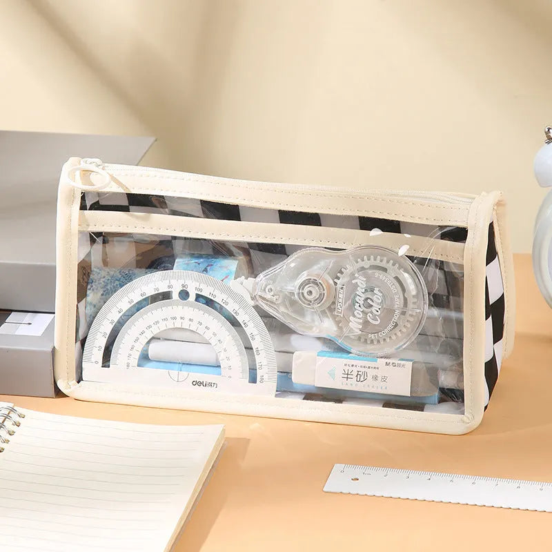 Transparent PVC pencil case with a chessboard grid pattern, showing pens inside.