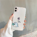 Transparent iPhone case with dinosaur design showing green dinosaur pattern on back
