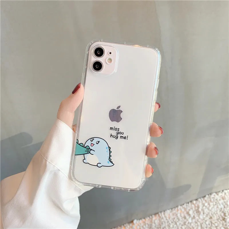 Transparent iPhone case with dinosaur design showing green dinosaur pattern on back