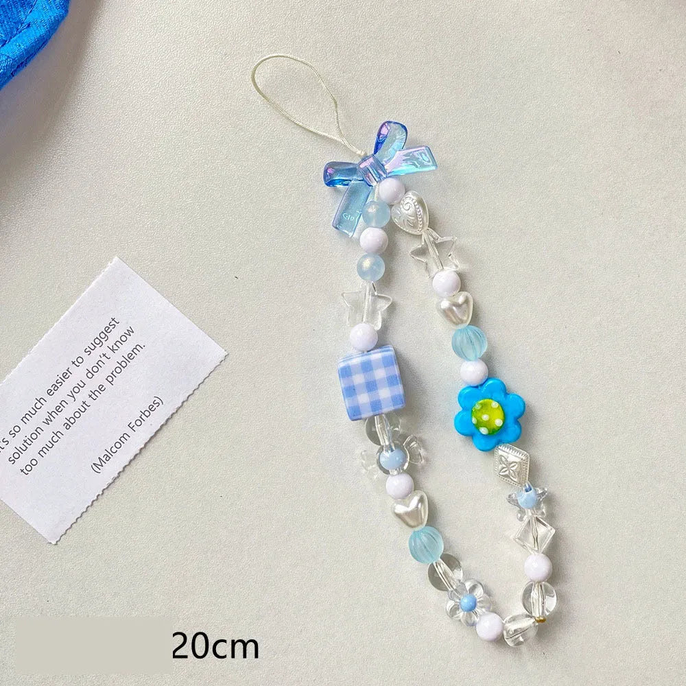 Colourful beaded flower mobile phone lanyard on rope with blue, pink, and yellow options
