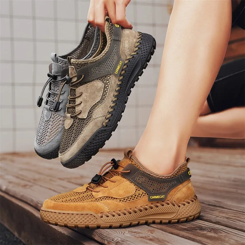 Men's brown suede low-top casual tennis shoes with a visible elastic band and hand-stitched rubber sole.