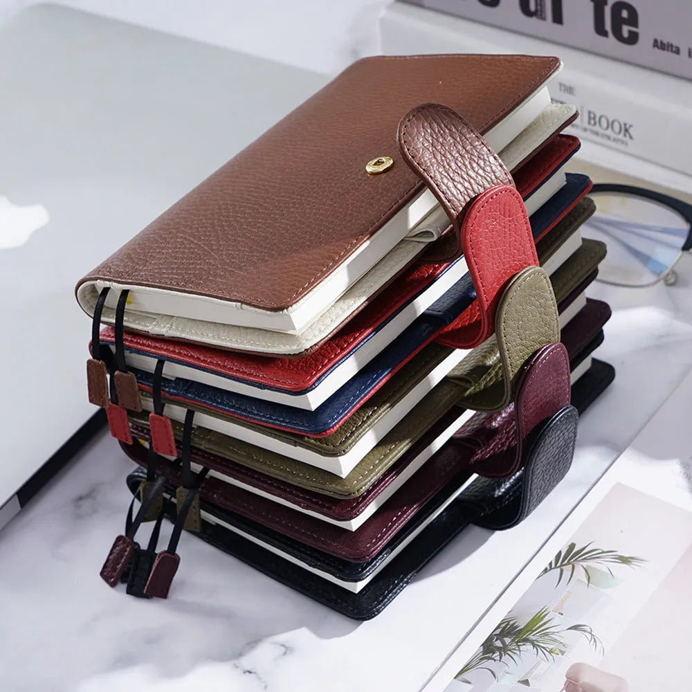 A6 loose-leaf diary with lychee pattern head layer cowhide cover in off white, pink, and white