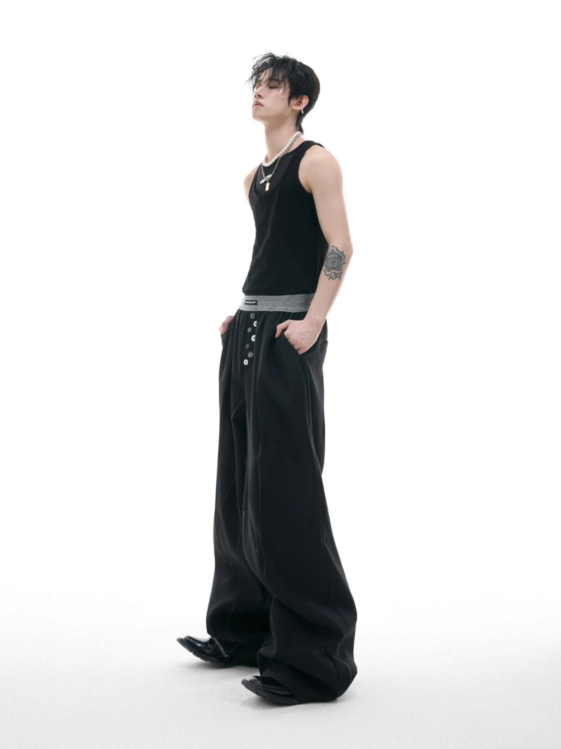 Straight-leg high-waist trousers with button-open line design in polyester cotton blend fabric