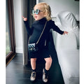 Black sleeveless floral dress for children in polyester with sizes 90 to 130