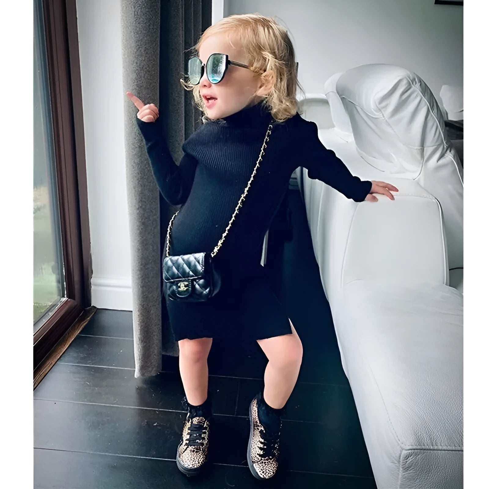 Black sleeveless floral dress for children in polyester with sizes 90 to 130