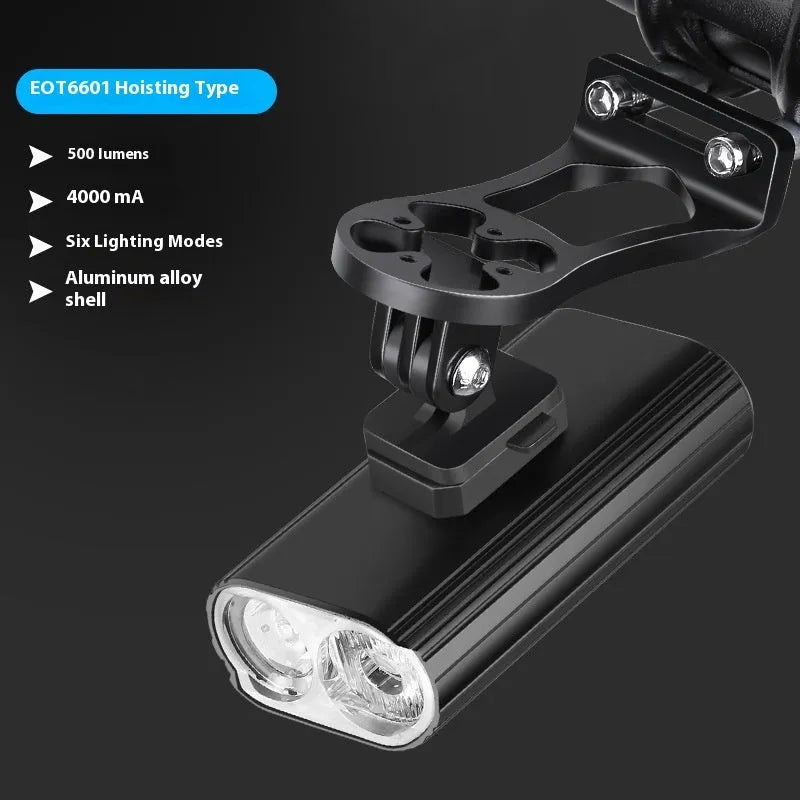 Black bicycle headlight with USB Type-C charging port and aluminium alloy body mounted on handlebars