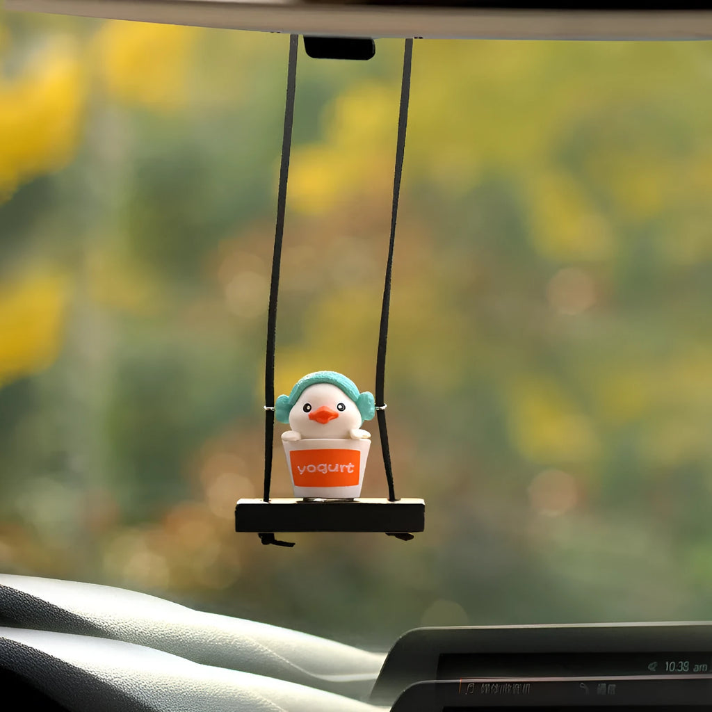 Yellow plastic duck doll car hanging ornament showing four style options: bath towel, swimming ring, bath bucket, and bow.