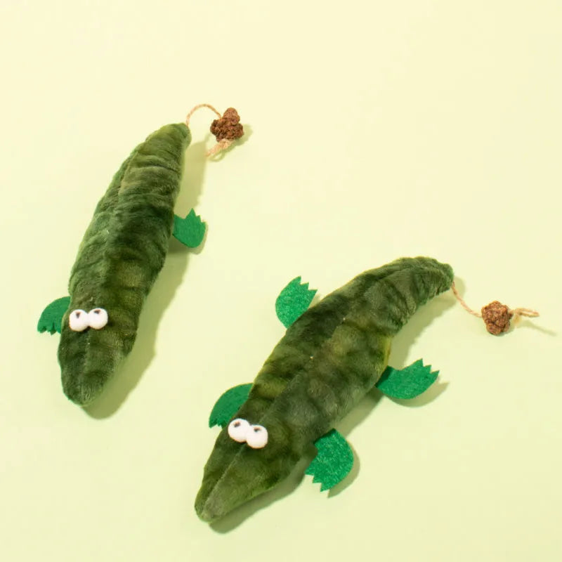 Green plush alligator catnip toy measuring 35 cm long with plant-based construction