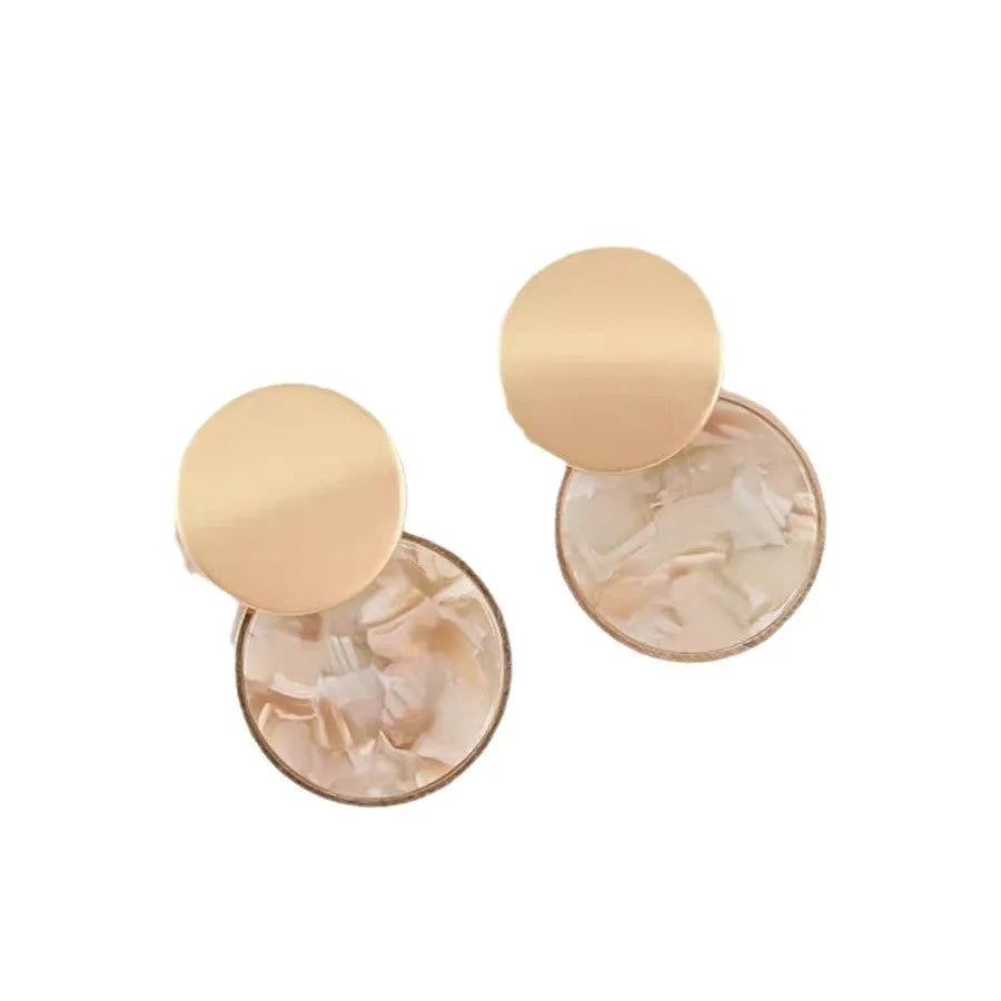 Round matte resin female earrings with retro design and smooth surface for casual wear.