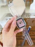 Brown transparent silicone Apple Watch strap showing clear construction and band attachment mechanism