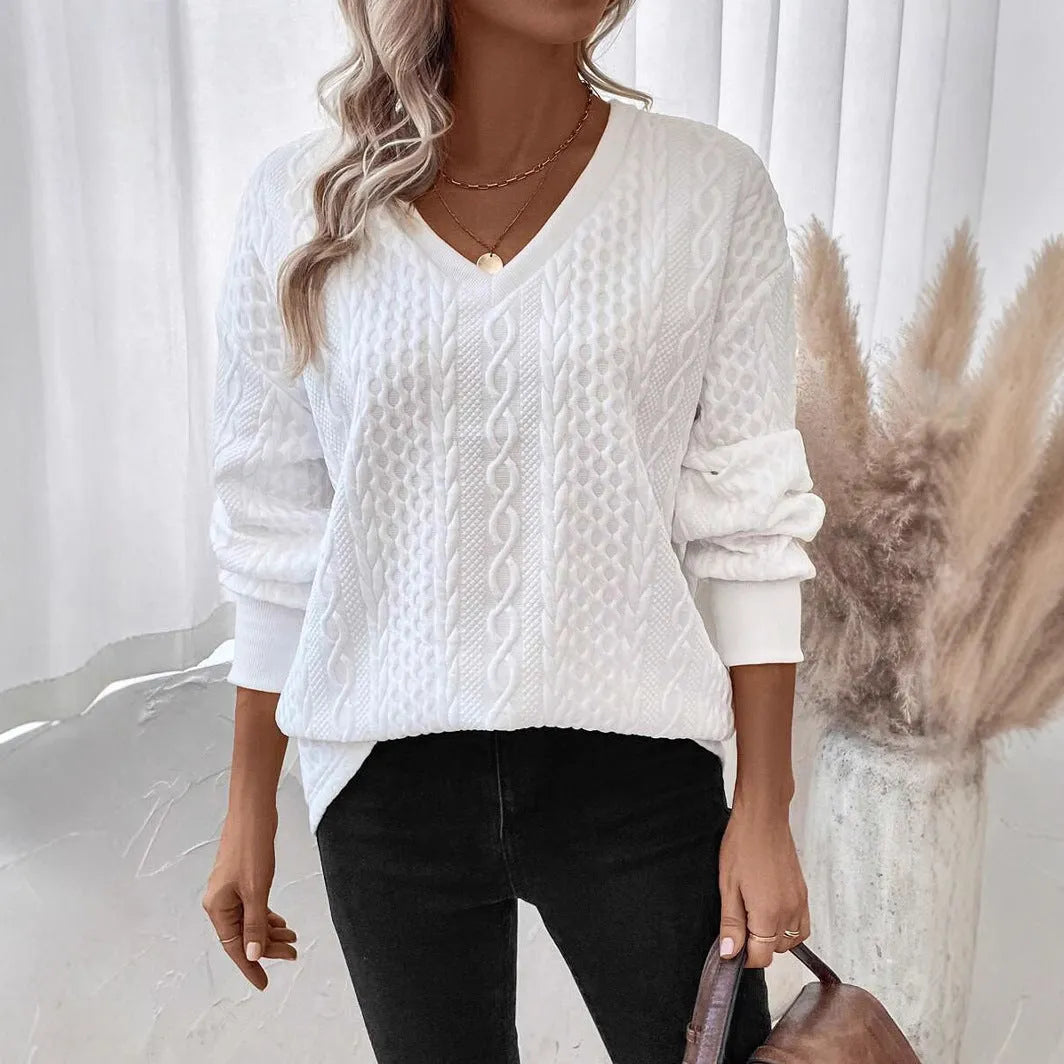 Milky white loose fit long sleeve T-shirt with a raised 3D pattern on the front.
