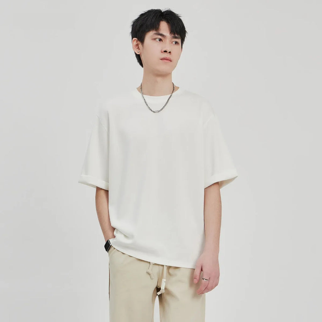 Men's drape knit loose fit t-shirt in polyester blend fabric showing black, brown, and white colour options