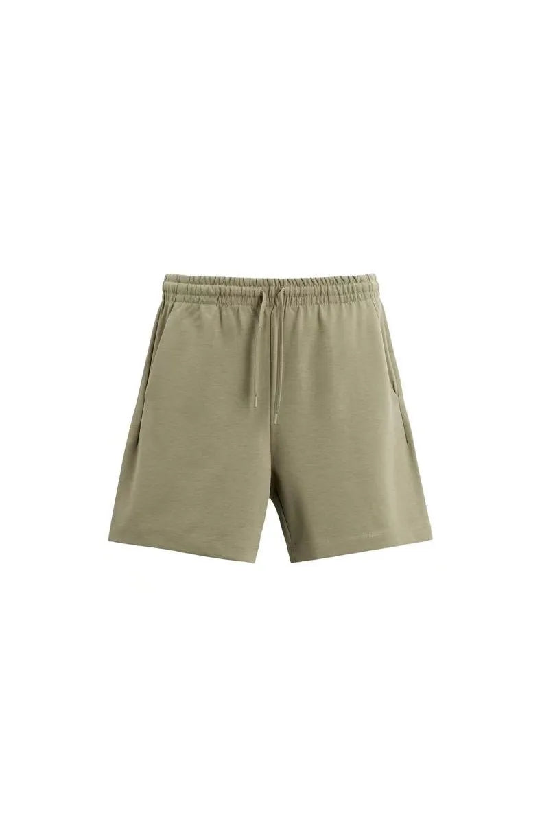 Loose double-sided cloth texture short sleeve top and matching shorts set on a hanger.
