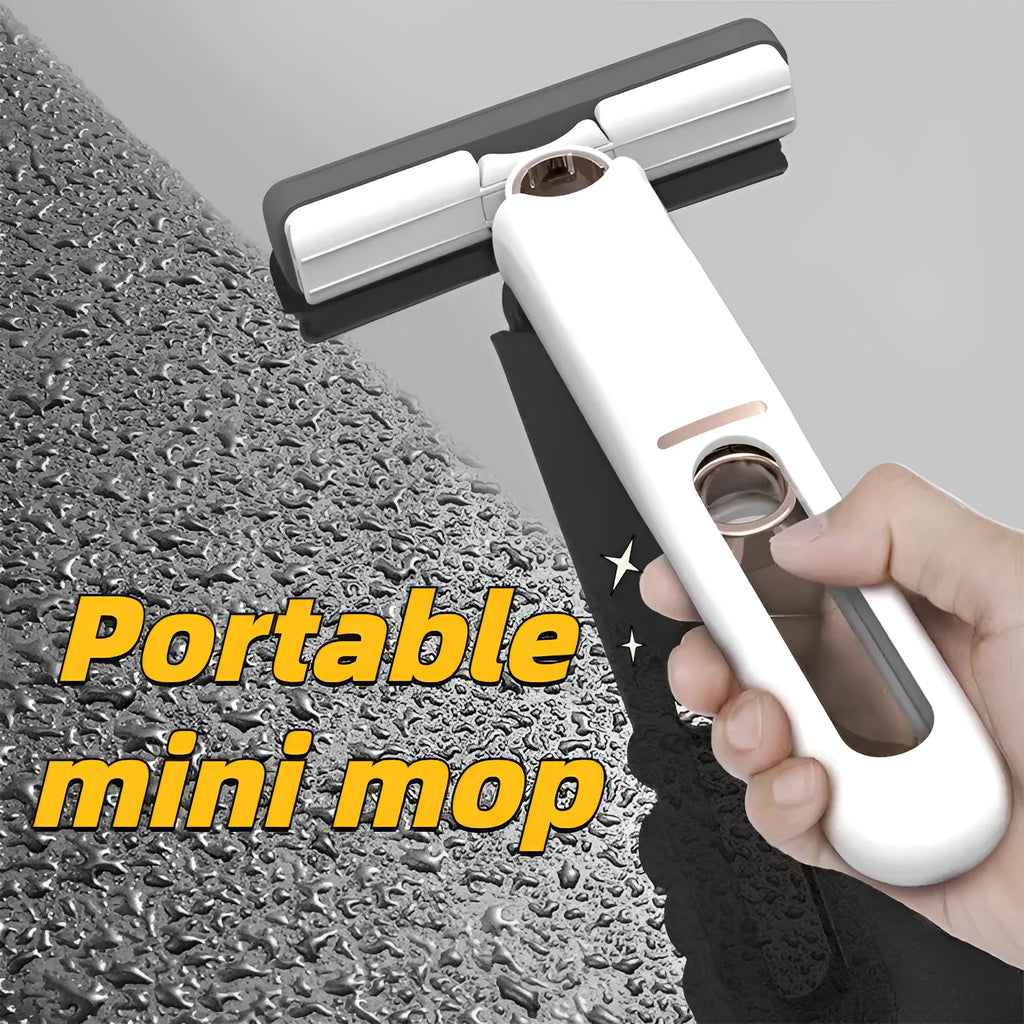 Portable self-squeeze mini mop with sponge head folded 180° for wringing, compact size for cleaning desk and window