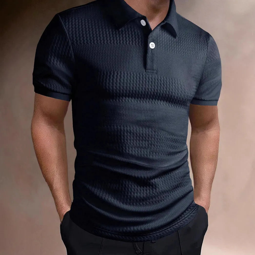 Men's striped polo shirt in loose fit with short sleeves showing asymmetric design details