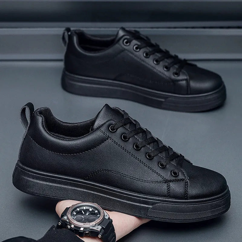 Men's low-top casual sneakers in white, black, and black with white bottom colour options.