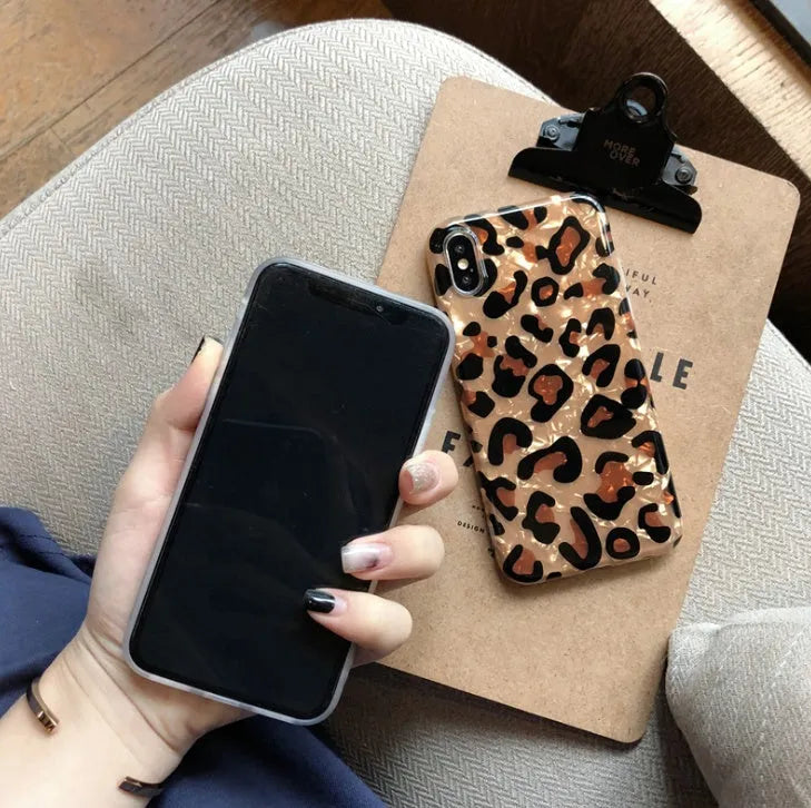 Leopard print silicone phone case for iPhone models showing colourful pattern and protective design