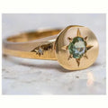 Golden oval asterism zircon ring with star design and adjustable opening