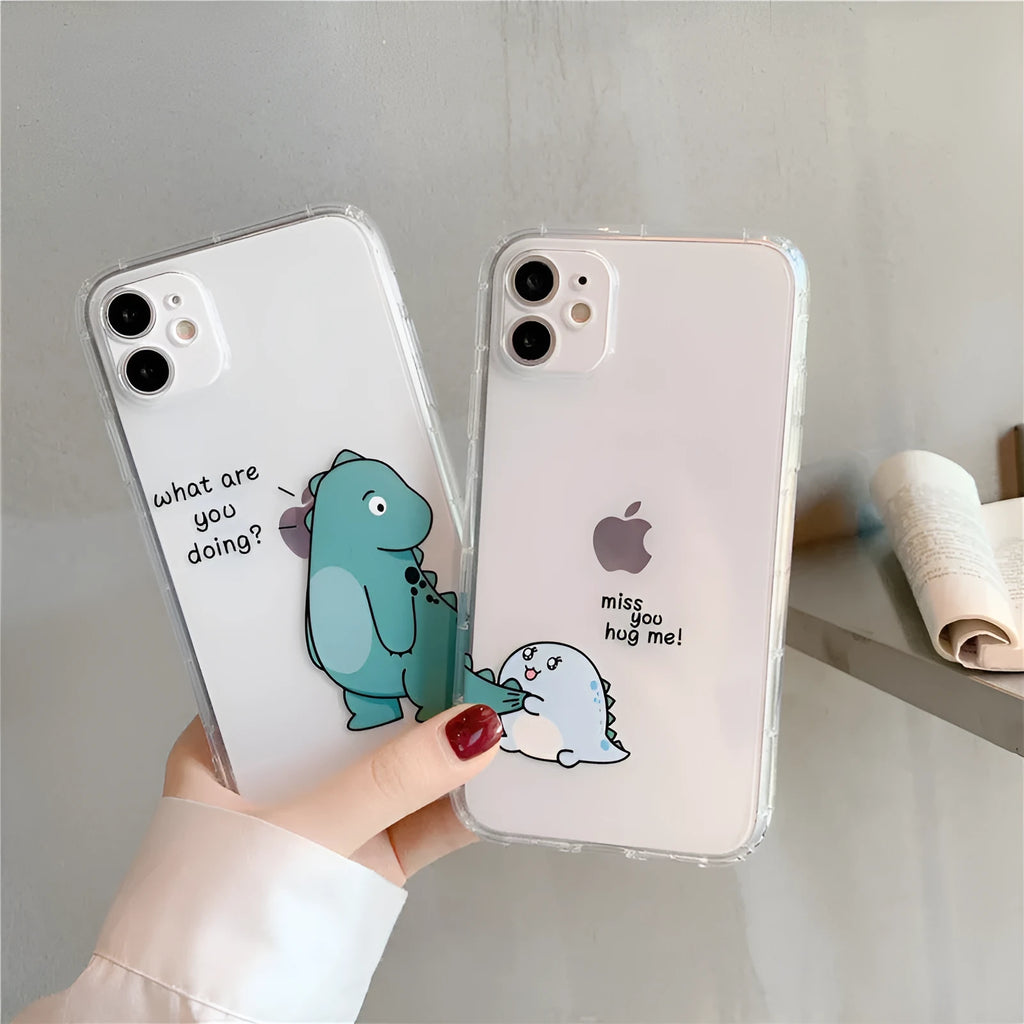Transparent iPhone case with dinosaur design showing green dinosaur pattern on back