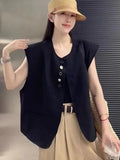 Women's loose fit polyester vest in short length with pockets, shown in milk white colour