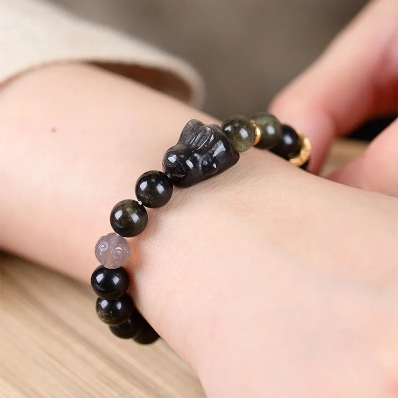 Handmade obsidian bracelet with lying rabbit charm in Jin Yaoshi and grey agate beads
