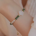 Chinese style antique bamboo joint bracelet with 4mm copper shell pearls and Hetian jade accents